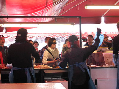 Asians and Southern Europeans dominate on both sides of the counters in the fish market